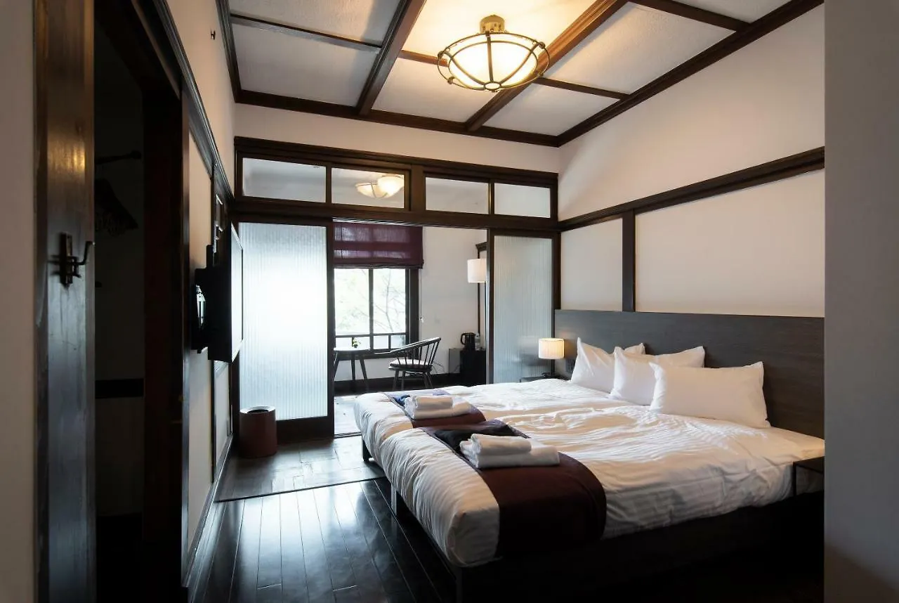 ** מלון First Cabin Station Kyoto Umenokoji Ryokan יפן