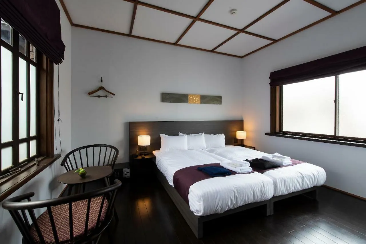 ** מלון First Cabin Station Kyoto Umenokoji Ryokan יפן